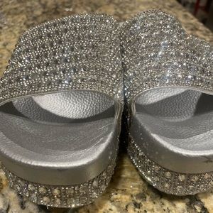 Cute silver stone slide on sandals.